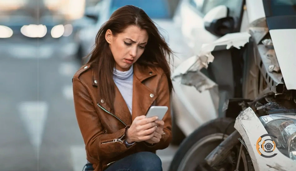 A Women Thinking What To Do After A Car Accident And Calling Cch For Car Recovery